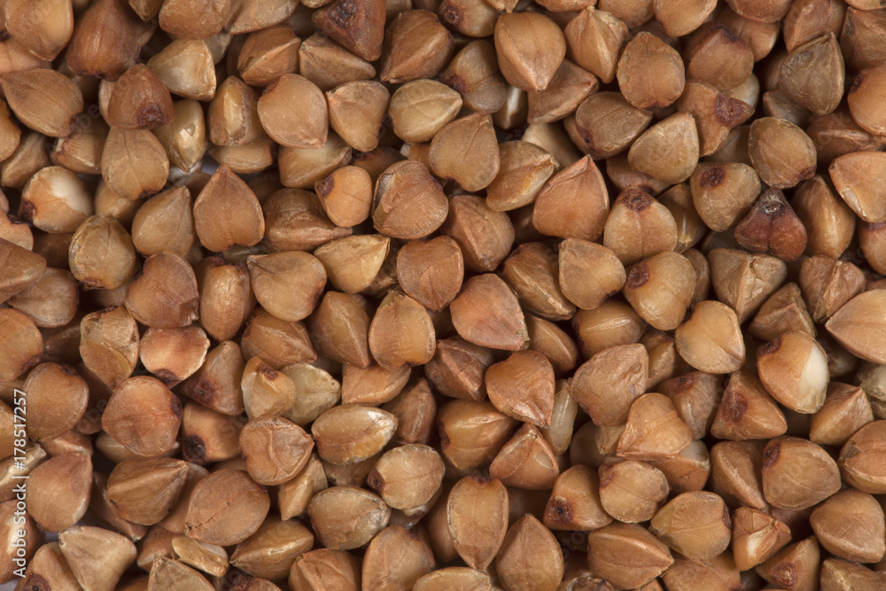 Background in the form of grains of buckwheat Background in the form of grains of buckwheat