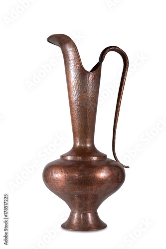 Photos Old copper jug with a lid on a white background
