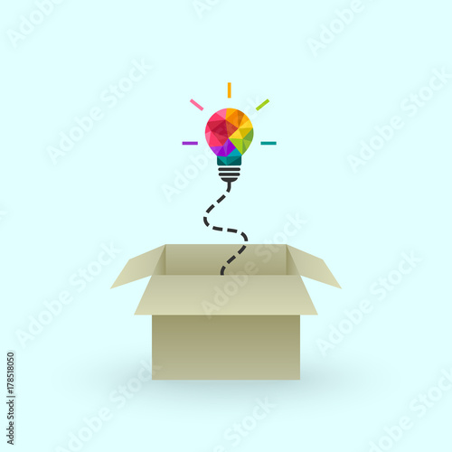 Think outside the box and creativity concept with colorful lightbulb and cardboard box