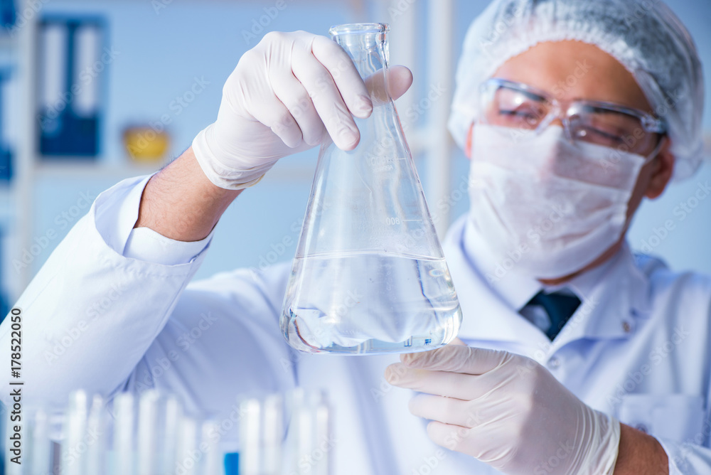 Female scientist researcher conducting an experiment in a labora
