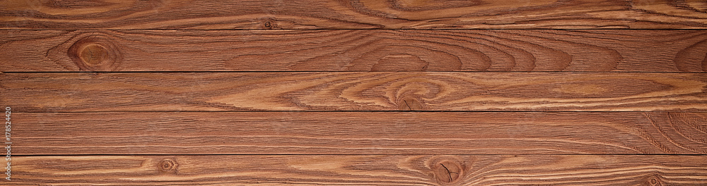 Wooden background with copyspace, brown striped timber desk, old table or floor