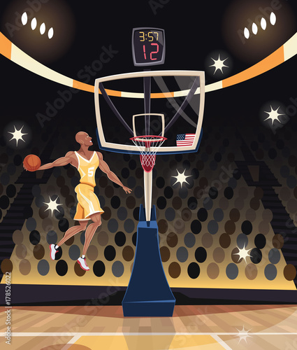 Basketball player dunking in basketball arena