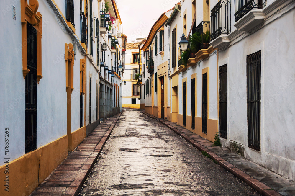 Quiet empty street in residential area of Cordoba, Spain