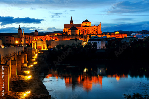 Wallpaper Mural Roman bridge and La Mezquita at sunset in Cordoba, Spain Torontodigital.ca