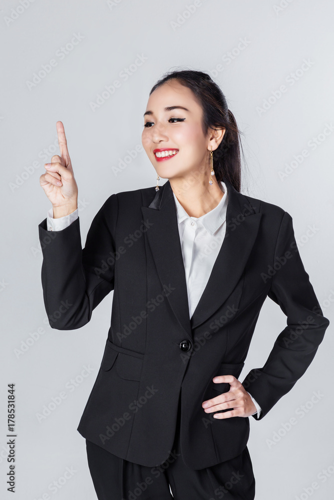 asian business woman with action pose in studio with white background asian business woman with action pose in studio with white background