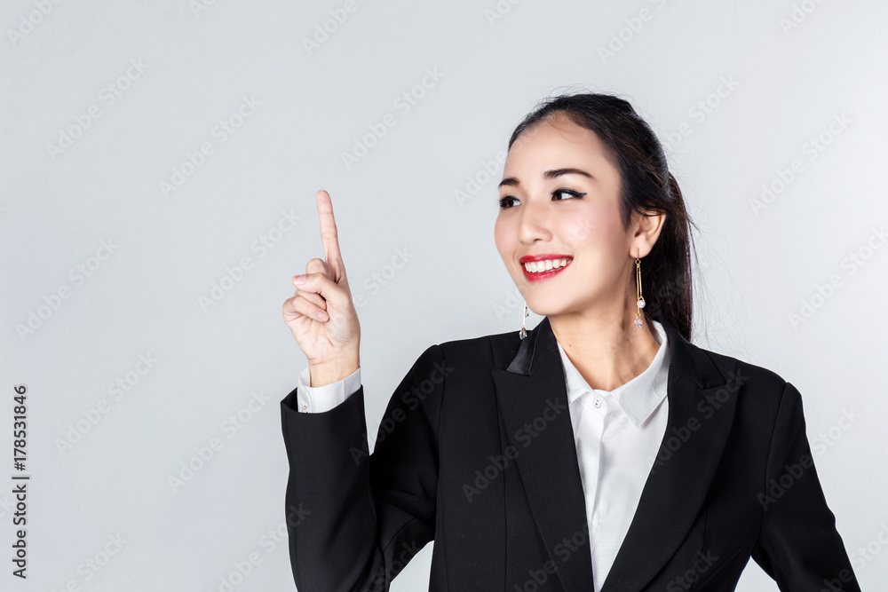 asian business woman with action pose in studio with white background asian business woman with action pose in studio with white background