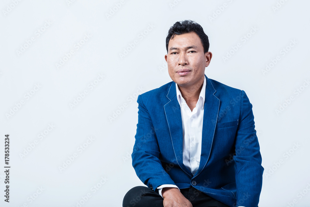 studio portrait of an asian businessman. studio portrait of an asian businessman.
