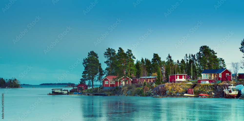 Fisherman village in Sweden at winter after sunset - winter seasonal scandinavian background