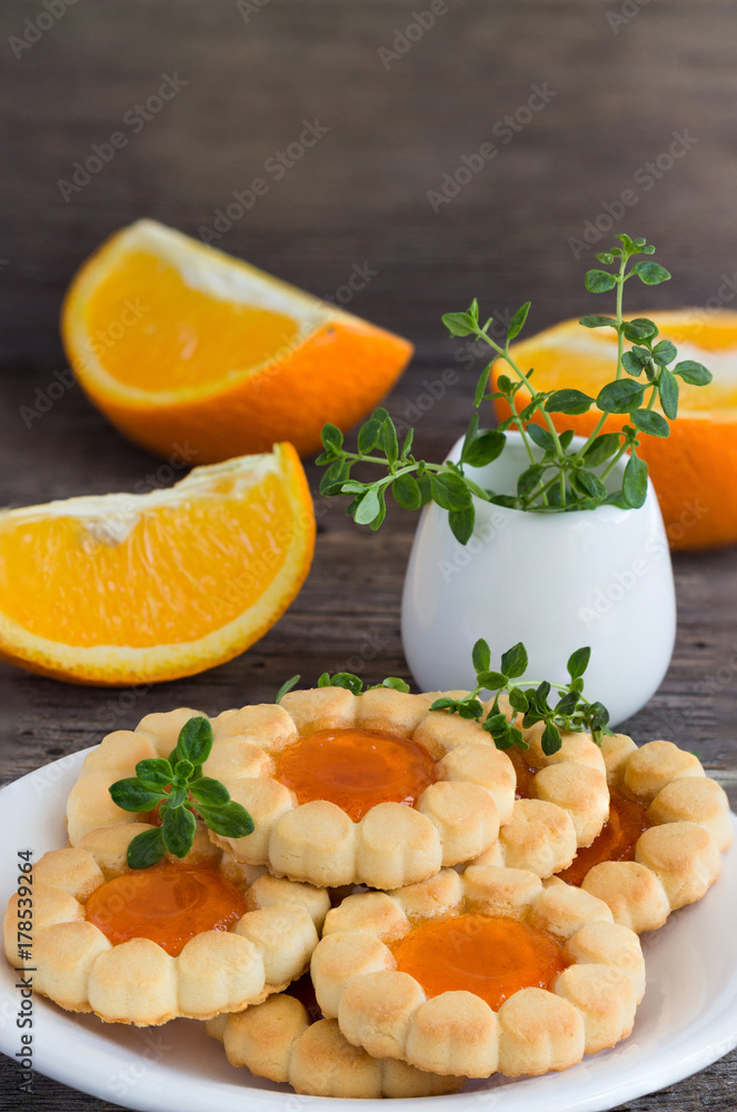 Biscuits with orange jam and thyme.