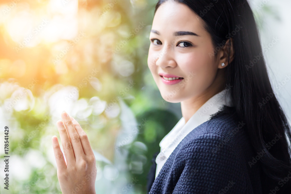 beautiful asian girl with white shirt action pose with white background and free copyspace beautiful asian girl with white shirt action pose with white background and free copyspace
