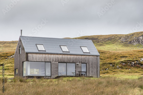 modern and luxury cabin made form wood and glass