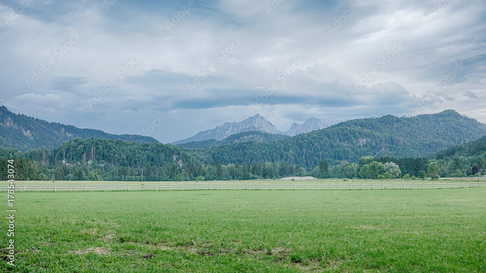 Amazing Bavarian Alps Landscape. Mountains with Storm Clouds.
