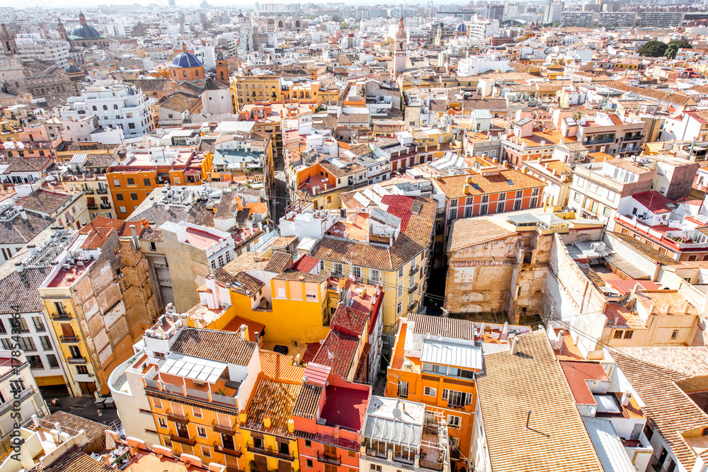 Fototapeta premium Top cityscape view on the old residential buildings in Valencia city during the sunny day in Spain