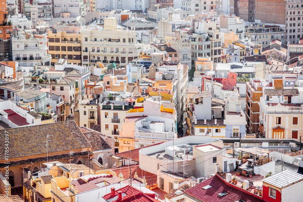 Fototapeta premium Top cityscape view on the old residential buildings in Valencia city during the sunny day in Spain