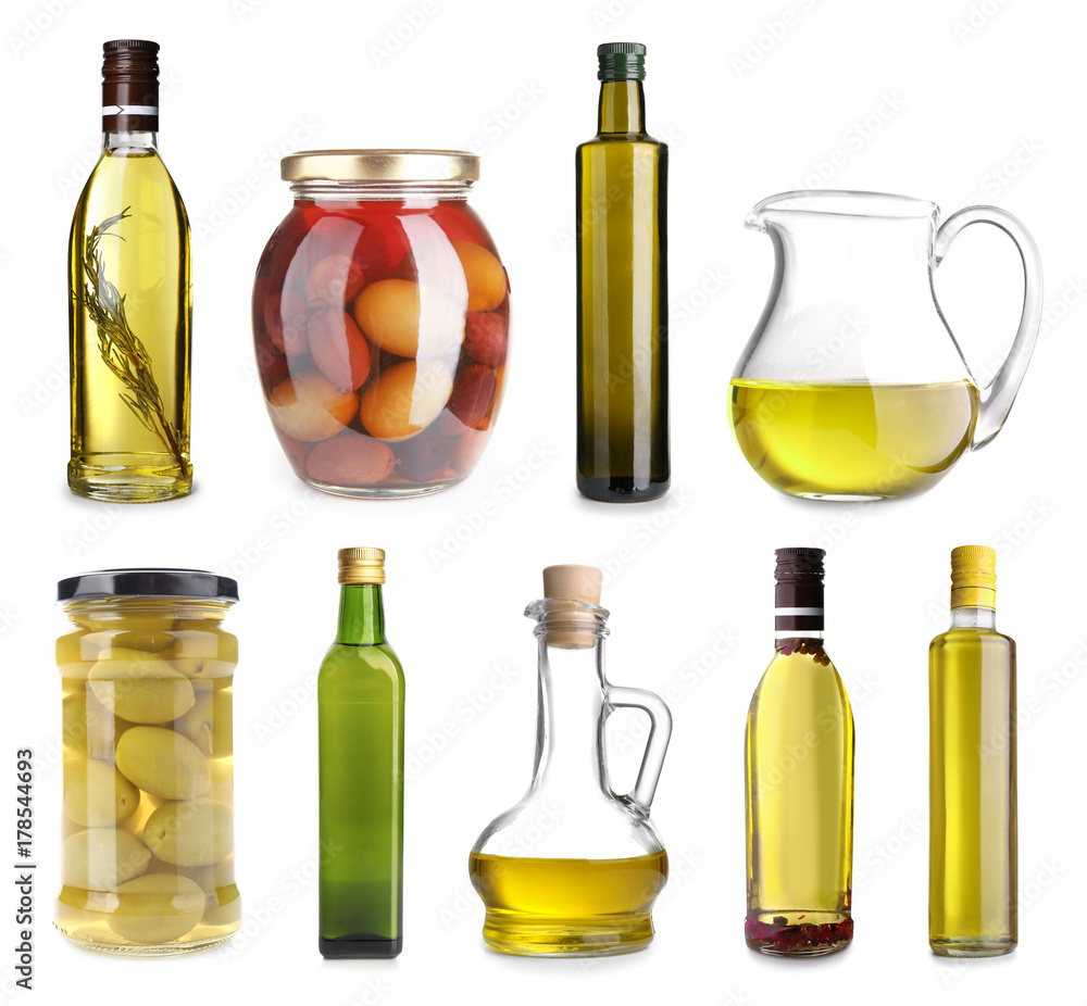 Glassware with canned olives and oil on white background