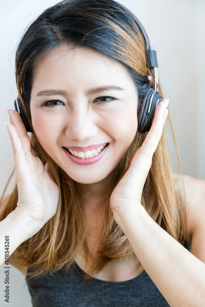 beautiful Asian Woman enjoy happy and laught Cheerful with headphone Portrait Concept beautiful Asian Woman enjoy happy and laught Cheerful with headphone Portrait Concept