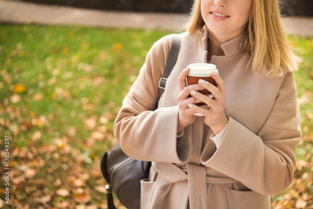young woman with paper takeaway coffee cup young woman with paper takeaway coffee cup