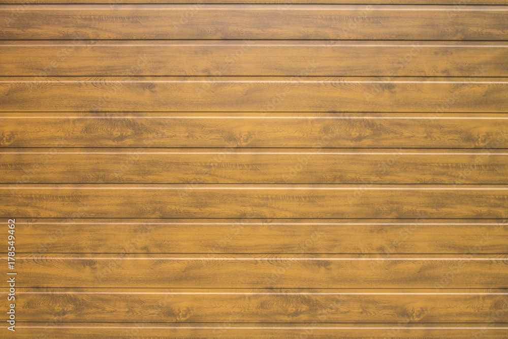 Fototapeta premium Wall of horizontal brown wooden panels for the background