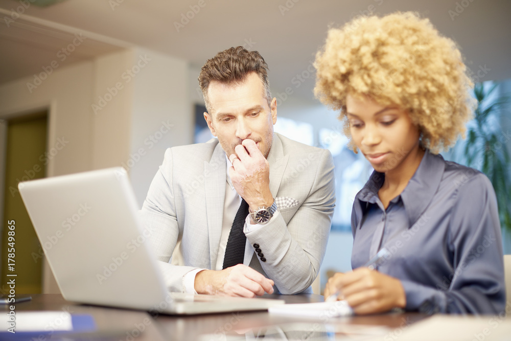 Teamwork at the office. Business team consulting about new project Teamwork at the office. Business team consulting about new project