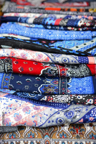 Rolls of colored russian fabrics © lukakikina