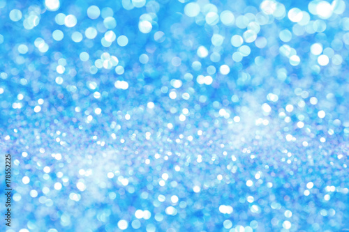 Holiday background with blue bokeh. Abstract background.