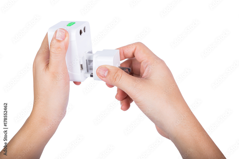 Hand Putting Plug Into Electricity Socket Hand Putting Plug Into Electricity Socket