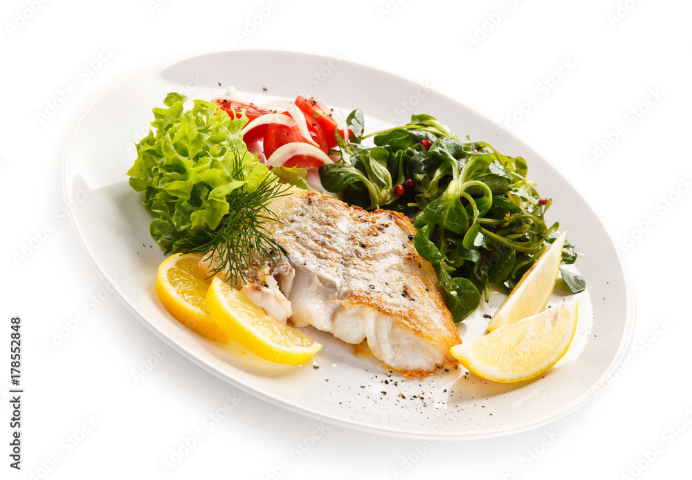 Fish dish - fried fish fillet and vegetables Fish dish - fried fish fillet and vegetables