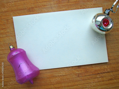 Wallpaper Mural Christmas toys and a piece of paper on a wooden background Torontodigital.ca