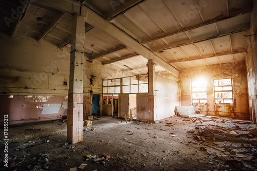 Ruined interior of hall of abandoned industrial building