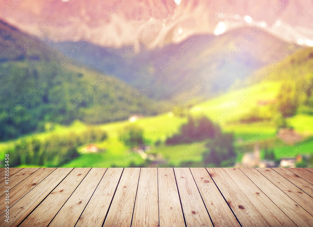 Wood table top on blur mountains background. Nature concepts. For montage product display or design key visual layout. Wood table top on blur mountains background. Nature concepts. For montage product display or design key visual layout.