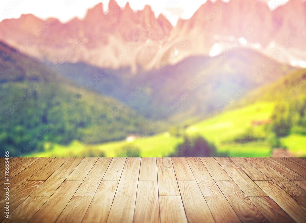 Wood table top on blur mountains background. Nature concepts. For montage product display or design key visual layout. Wood table top on blur mountains background. Nature concepts. For montage product display or design key visual layout.