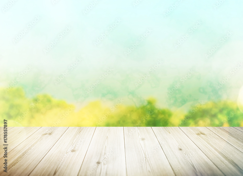 Wood table top on blur tree background. Summer, nature concepts. For montage product display or design key visual layout. Wood table top on blur tree background. Summer, nature concepts. For montage product display or design key visual layout.