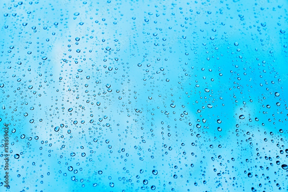 Rain. Autumn seasonal background with rain drops on the window. Autumn cold weather with rain and wind. Abstract colorful background. Rain. Autumn seasonal background with rain drops on the window. Autumn cold weather with rain and wind. Abstract colorful background.