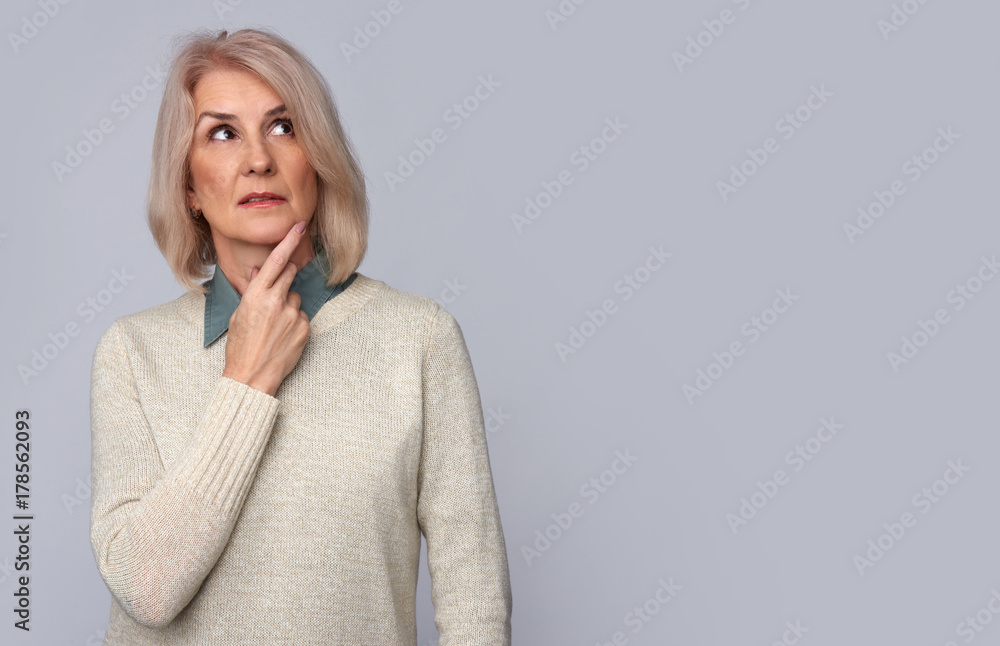 thoughtful old woman looking up. Isolated thoughtful old woman looking up. Isolated
