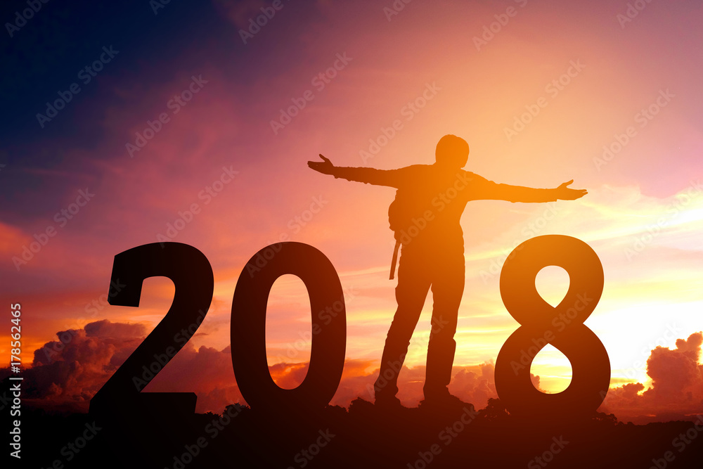 Silhouette of Traveler man Happy for 2018 new year Silhouette of Traveler man Happy for 2018 new year