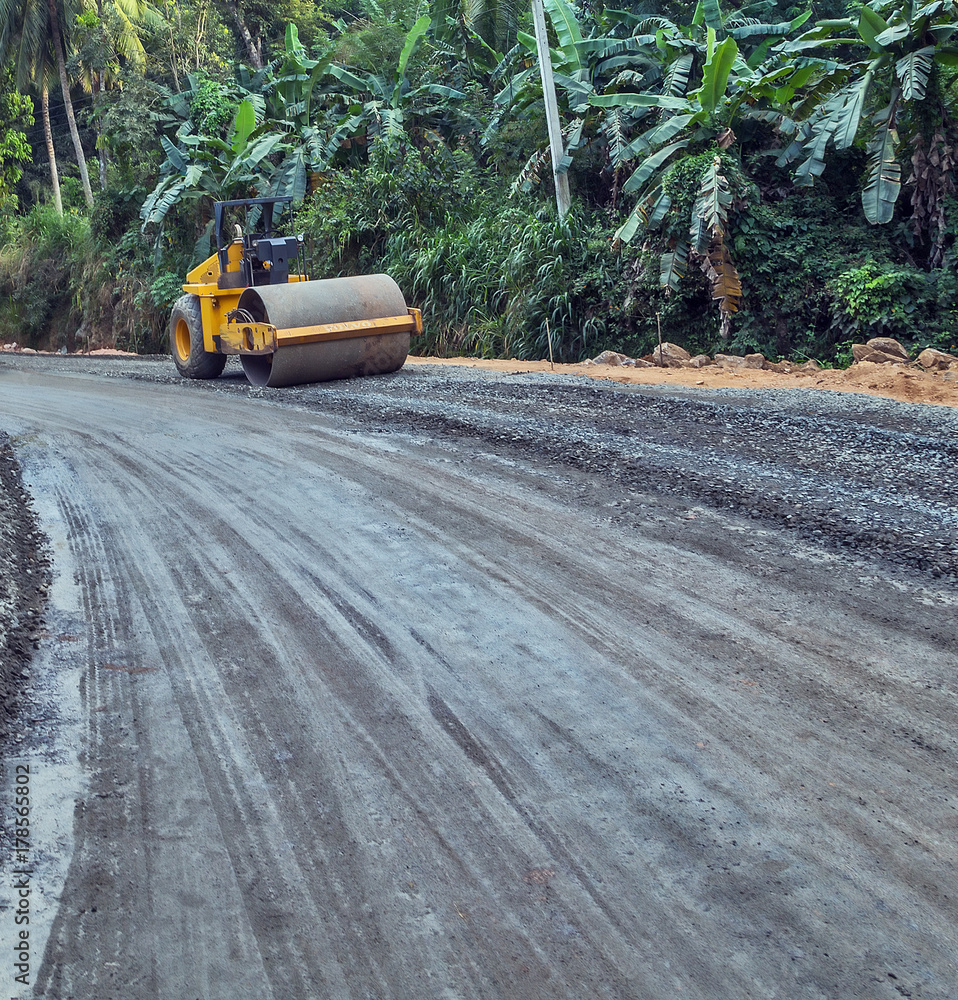 Vibration roller or construction road in jungle Vibration roller or construction road in jungle