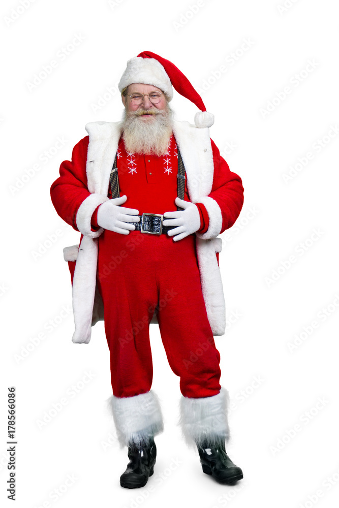 Santa Claus with hands on belly. Cheerful Santa Claus with real beard holding his hands on belt, isolated on white background. Santa Claus with hands on belly. Cheerful Santa Claus with real beard holding his hands on belt, isolated on white background.