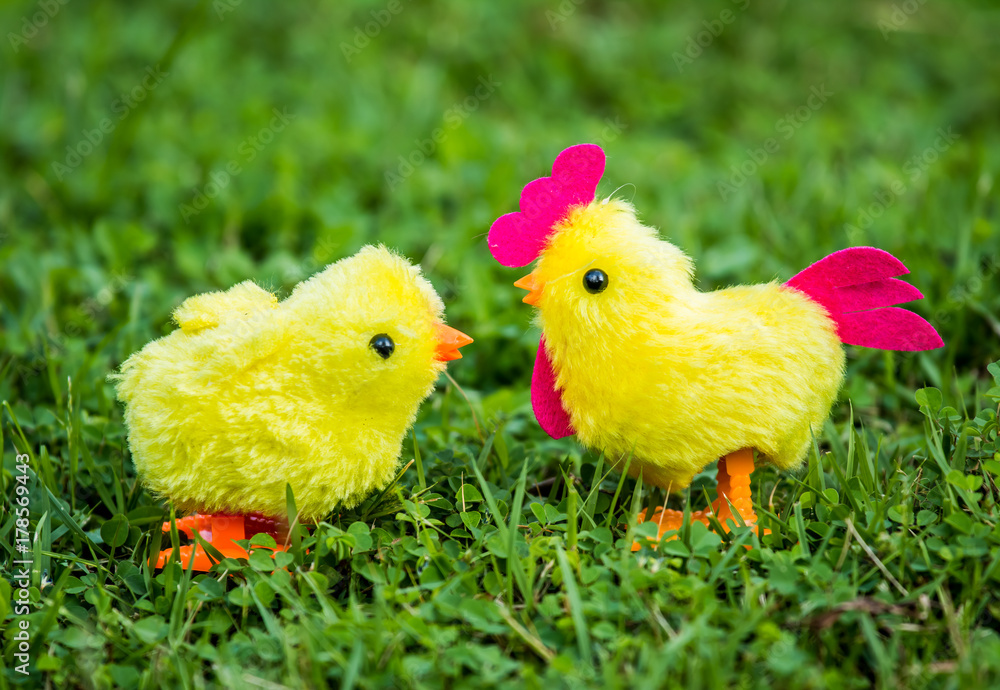 Chicken toy in the grass Chicken toy in the grass