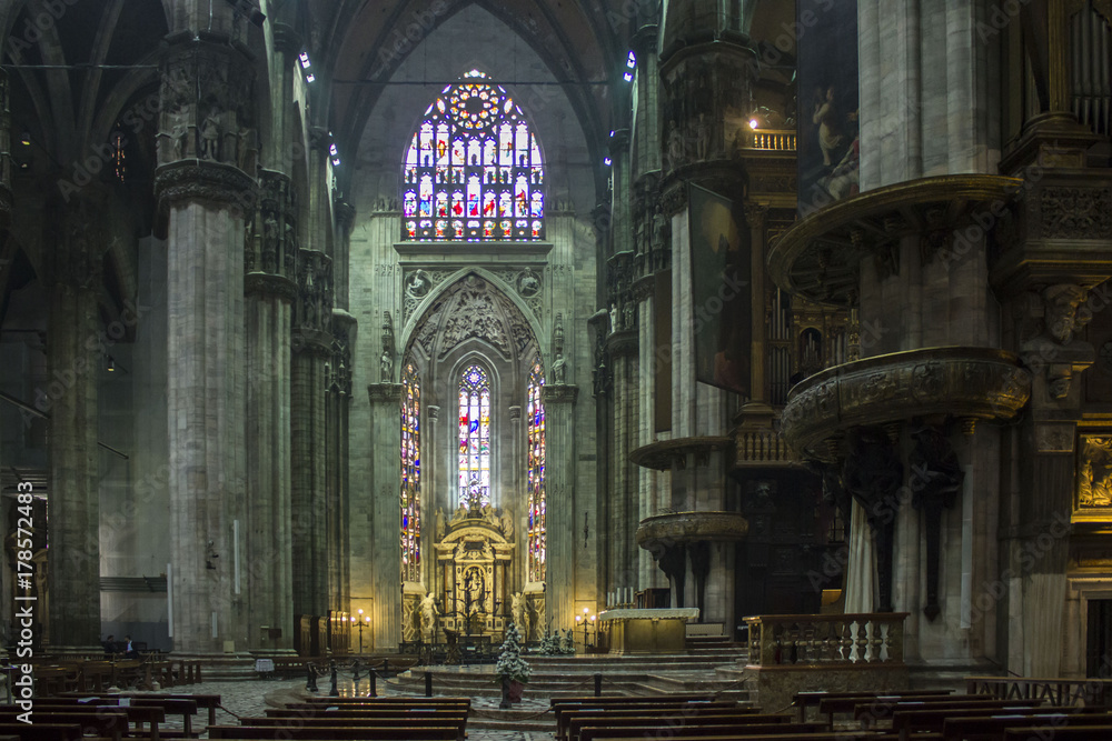Duomo Catheral in Milan, interiors of the liturgic area with benches and the altar, no people