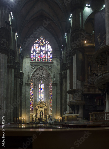 Duomo Catheral in Milan  interiors of the liturgic area with benches and the altar  no people