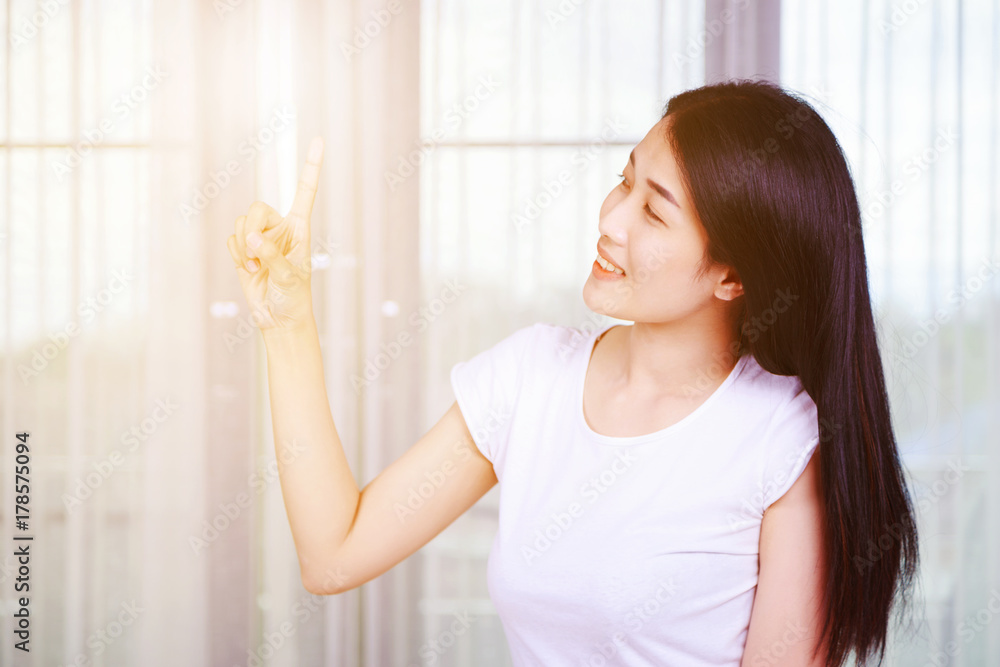 happy woman thinking with window background happy woman thinking with window background