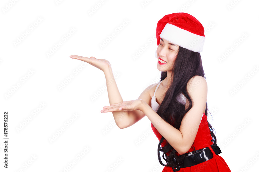 woman with empty blank palm hand in Santa Claus clothes isolated on white background woman with empty blank palm hand in Santa Claus clothes isolated on white background