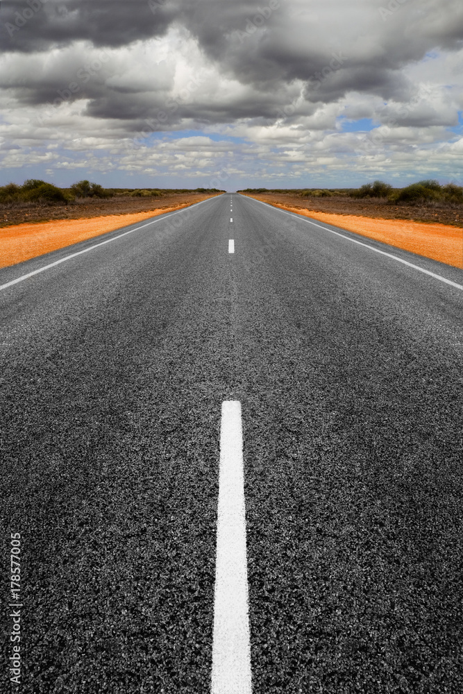 Long Straight Road with Gathering Storm Clouds Long Straight Road with Gathering Storm Clouds