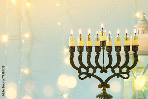 Image of jewish holiday Hanukkah background with menorah (traditional candelabra)