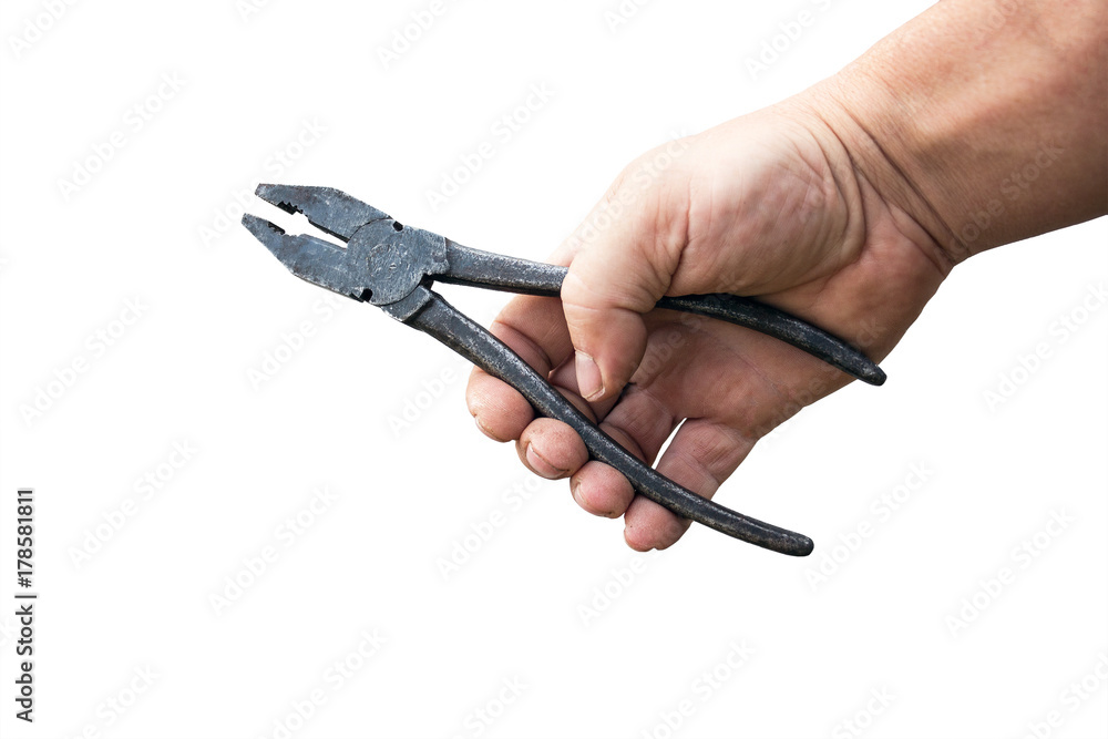 Old Pliers in a male hand isolated on white background Old Pliers in a male hand isolated on white background