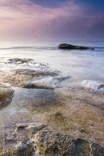 Canvas-taulu El amanecer de la costa
