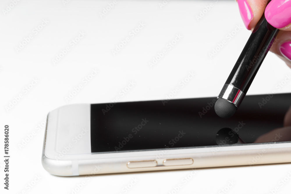 woman working with pen on smart mobile phone woman working with pen on smart mobile phone