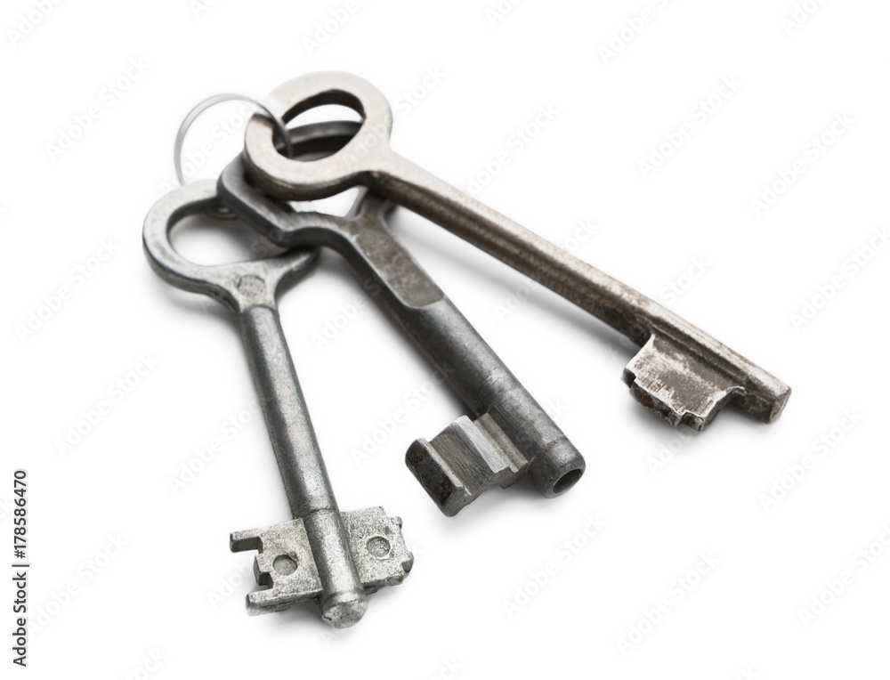 Set of rusty old keys on white isolated background Set of rusty old keys on white isolated background