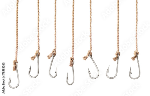 Schilderij op canvas Set of fishing hooks on the ropes isolated on a white background
