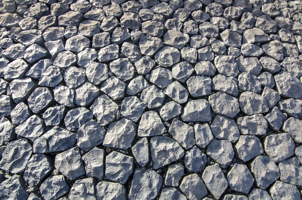 background and texture of granite stone wall surface background and texture of granite stone wall surface